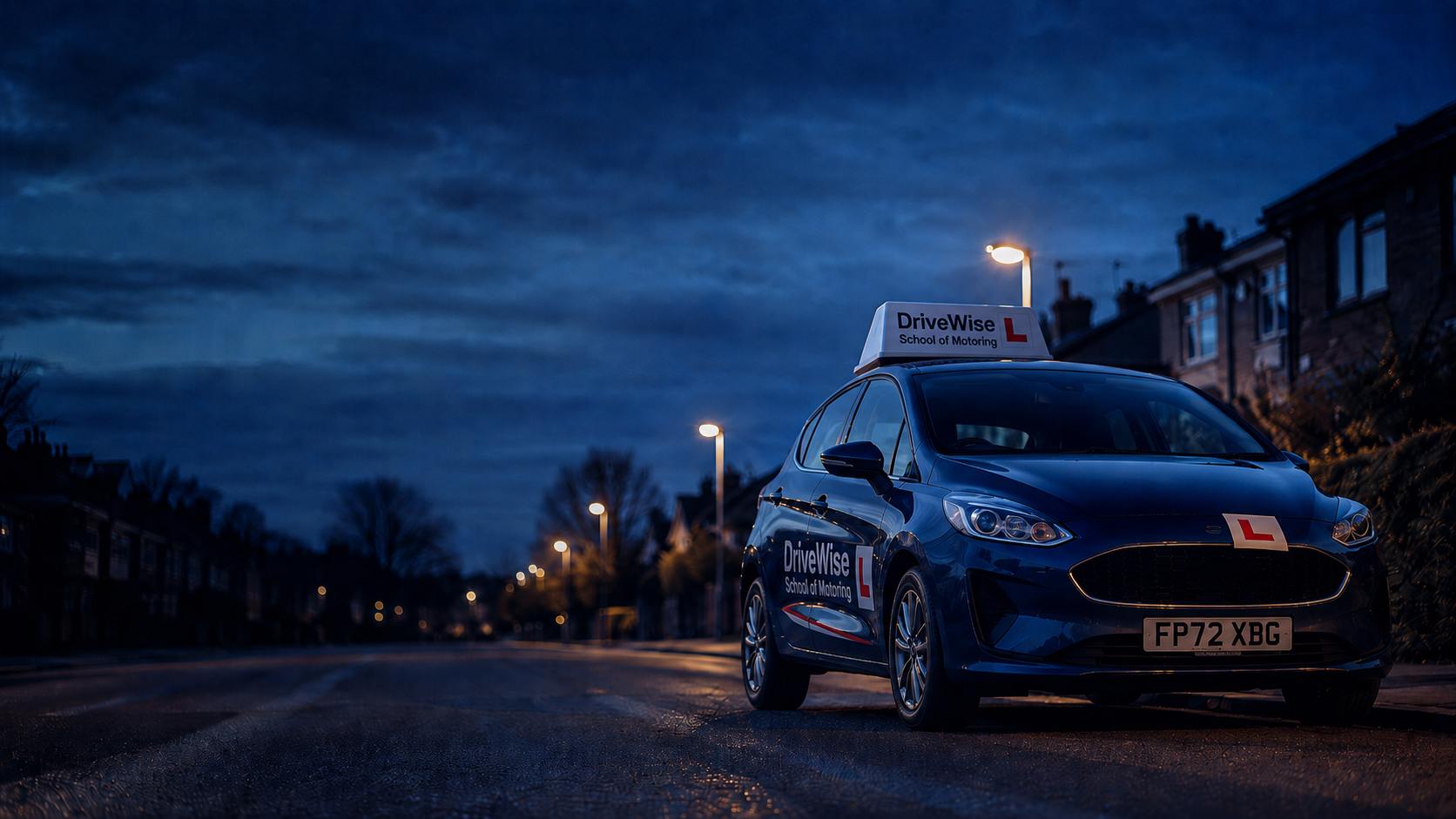 A learner driving school car parked on a street at dusk